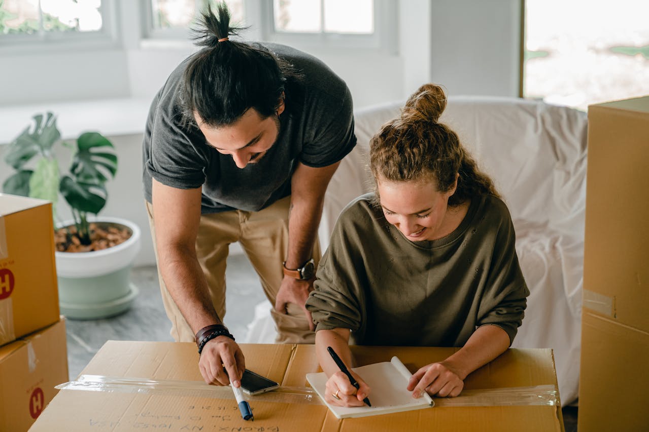 couple planning a relocation during the cheapest time of year for relocating.