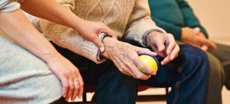 Person holding a stress ball