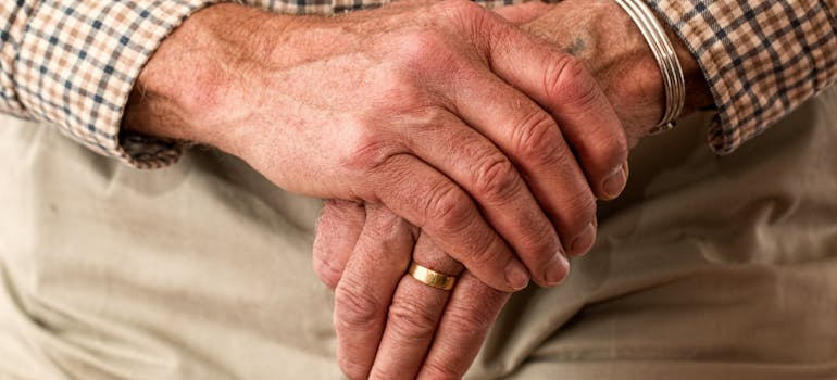 Person holding Rod