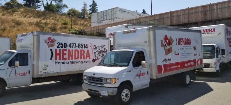 Hendra Moving and Storage trucks on the road.