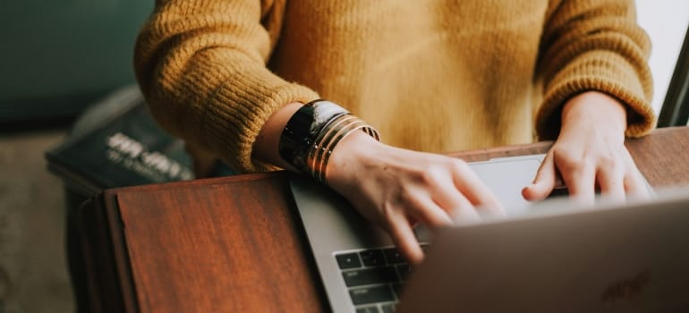 Picture of a person using a laptop 