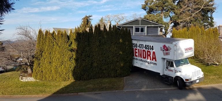 Hendra Moving and Storage truck parked to be loaded.
