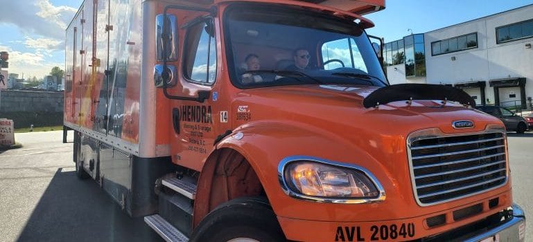 Orange Hendra moving truck