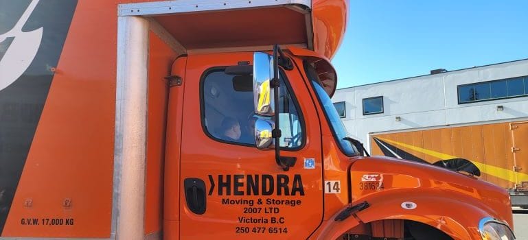 Orange Hendra Moving and Storage truck
