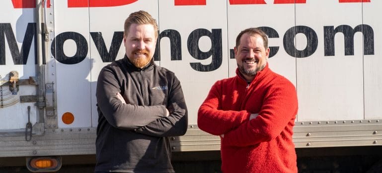 Two Hendra movers by the truck
