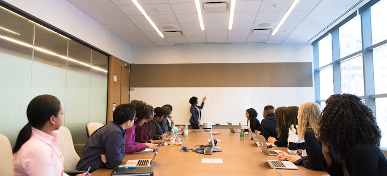 Business owner informing the stakeholders of the relocation in order to avoid one of the most common moving mistakes businesses make when relocating.