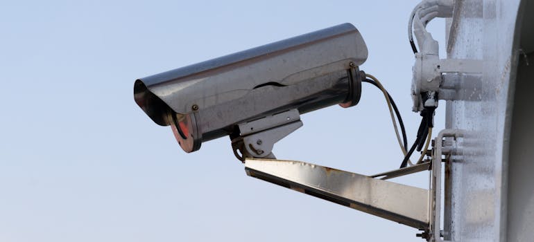 Security camera monitoring storage units, one of the advantages of renting storage for extended trips.