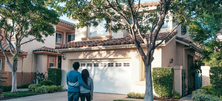 people looking at their new home