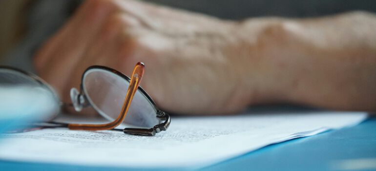 glasses resting on a piece of paper