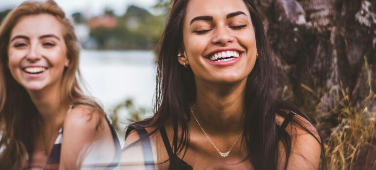 two girls smiling and having fun
