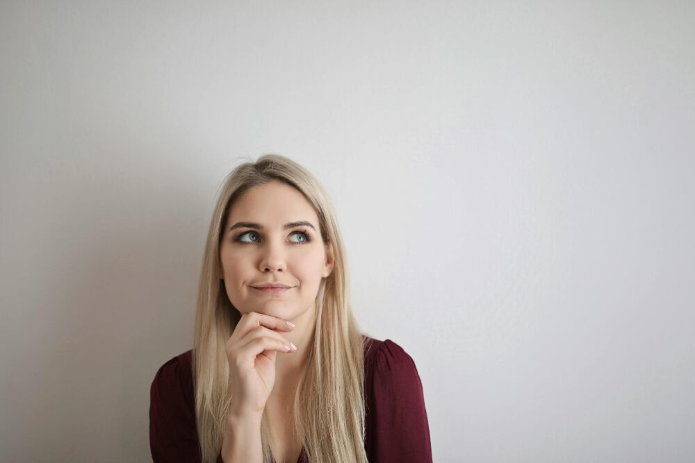 a woman thinking whether she should move to Sydney or Nanaimo