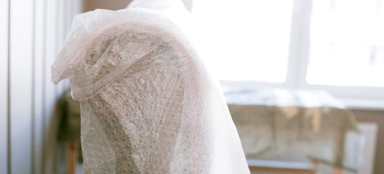 Picture of furniture wrapped in bubble wrap 