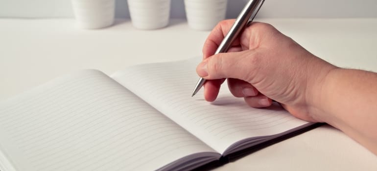 Picture of a person making a plan before moving to Nova Scotia