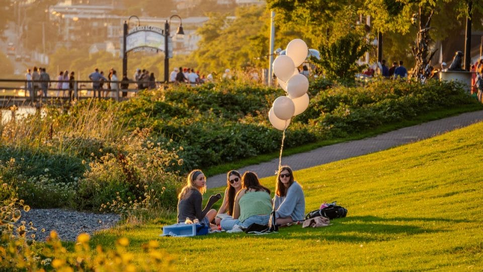 Group of Friends with Balloons in Park