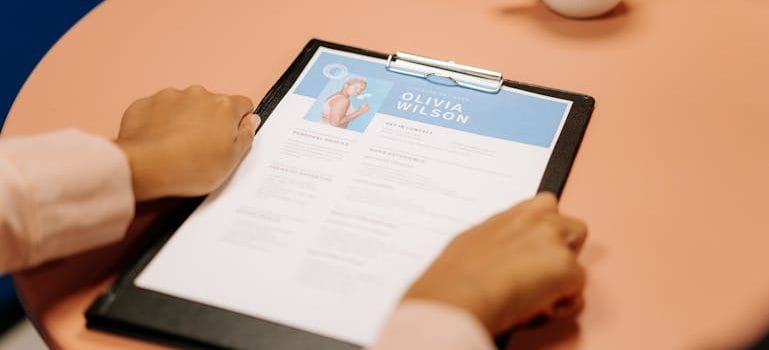 Person Holding Black Tablet Computer
