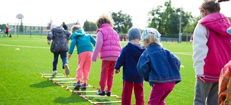 Children's Team Building on Green Grassland