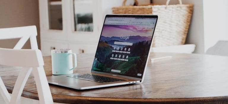 Reading about How to Avoid Moving Scams on a laptop