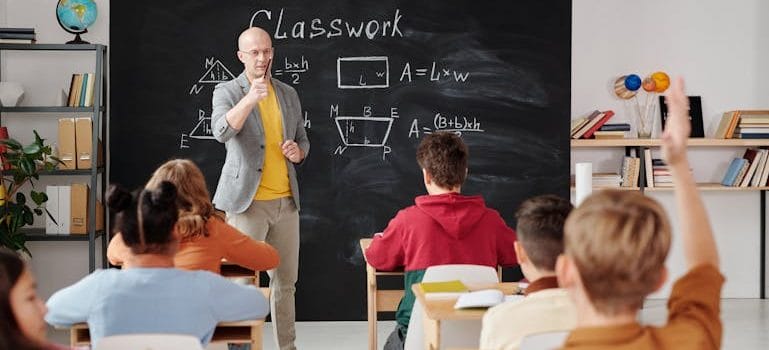 Teacher Asking a Question to the Class