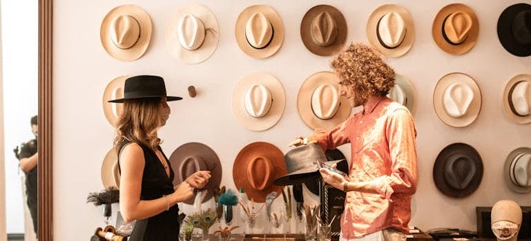 A Couple Shopping for Hats