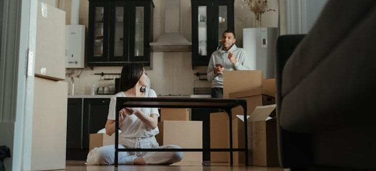 a couple talking about How to Save Money on Your Next Move