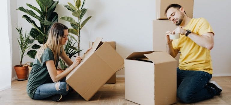 a couple talking about Packing Checklist for a Stress-Free Move