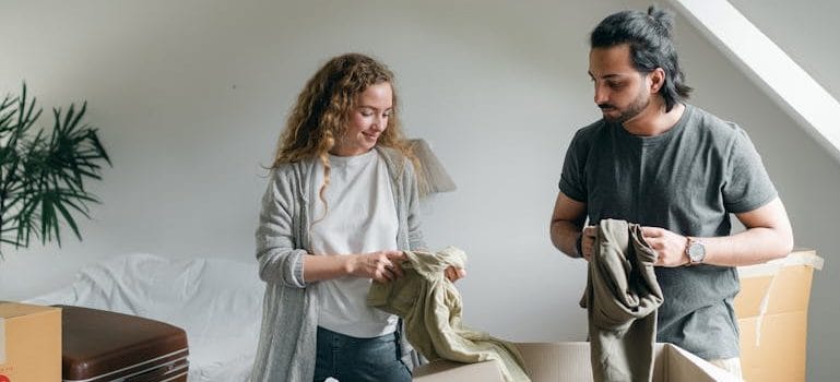 a couple talking about what to expect when You're Expecting to Move