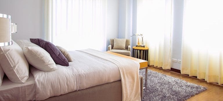 White Bed Comforter during Daytime
